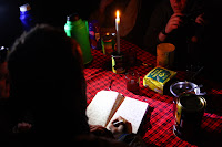 Diary writing in the mess tent