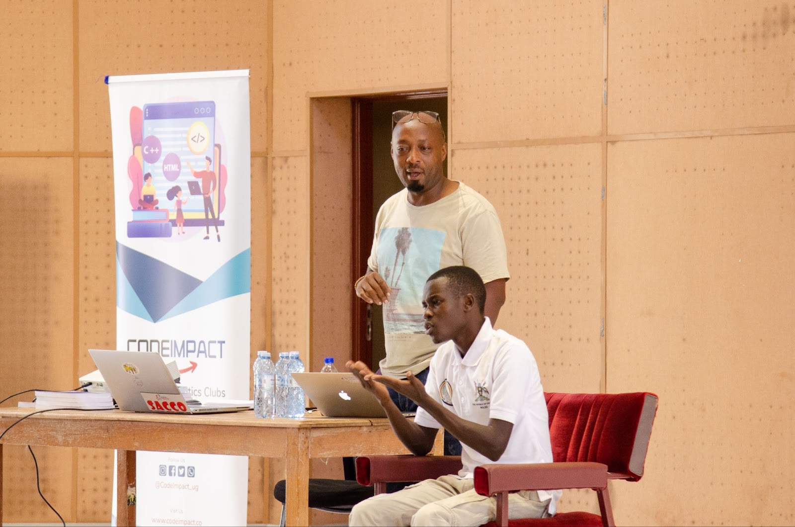Alex Shyaka the CEO of codeimpact giving a  talk at Makerere University about inclusiveness in Tech