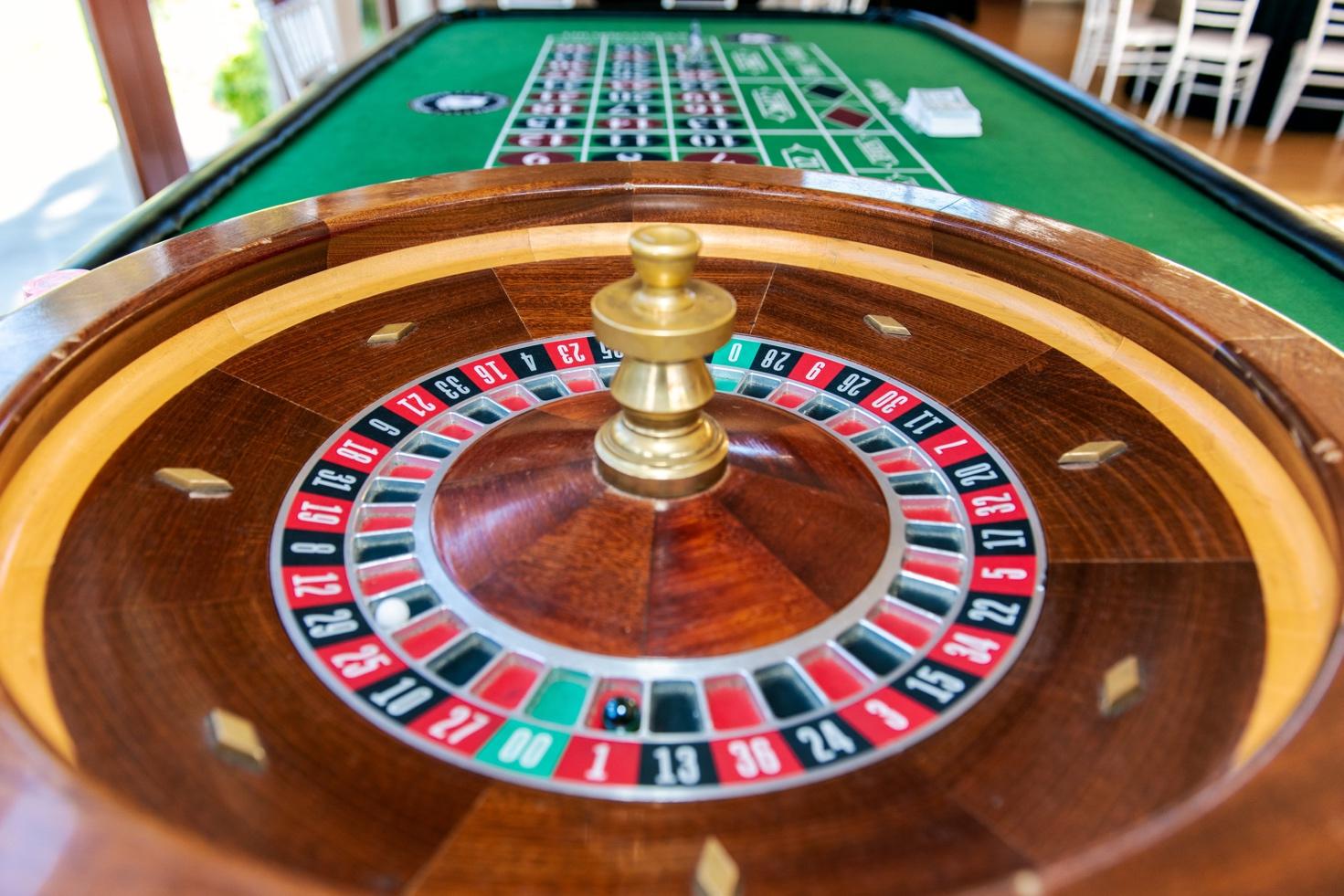 A close-up of a roulette wheel

Description automatically generated