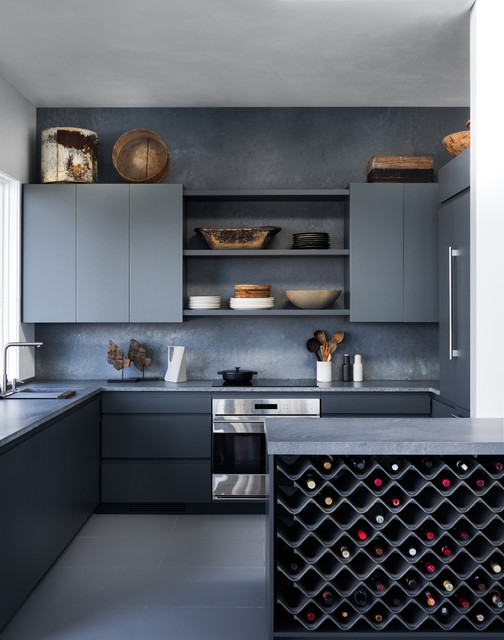 Use a dark colour scheme to make your kitchen feel larger