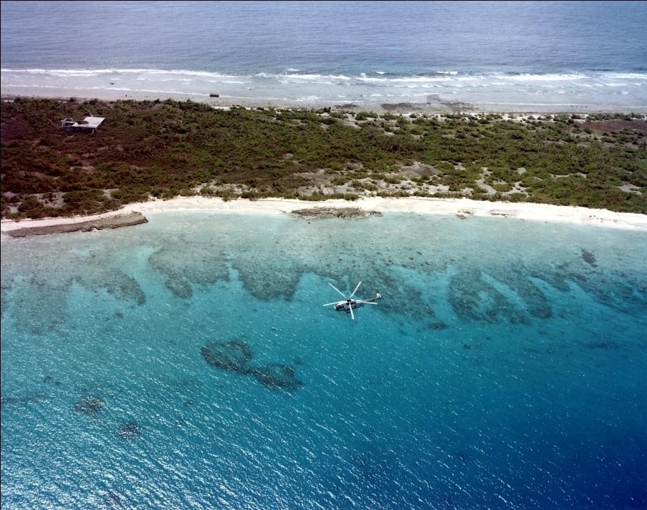 https://upload.wikimedia.org/wikipedia/commons/4/4c/Sikorsky_SH-3G_Sea_King_from_Helicopter_Combat_Support_Squadron_1_in_flight_during_an_aerial_radiation_survey_over_Bikini_Atoll_in_November_1978.jpg