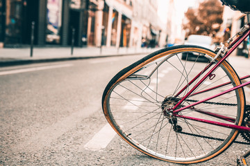 Damaged bicycle with a bent wheel during a bicycle accident collision