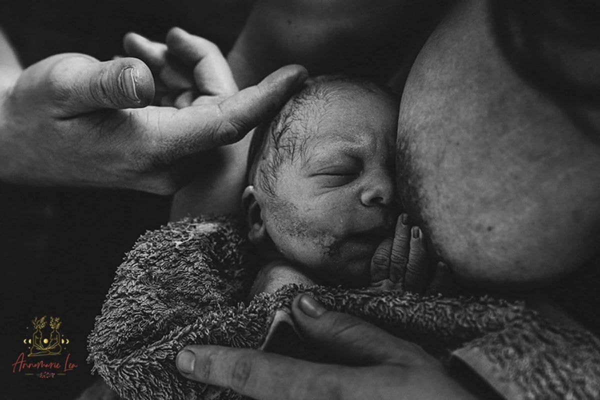 Baby breastfeeding just after birth