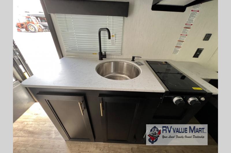 Sink in the Forest River Cherokee Wolf Pup travel trailer