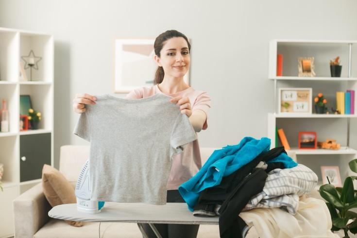 C:\Users\Кристина\Downloads\young-girl-standing-ironing-board-with-clothes-living-room.jpg