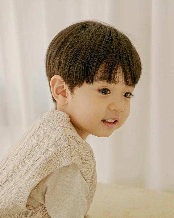 Asian 1 year old babies wear mostly bowl cut