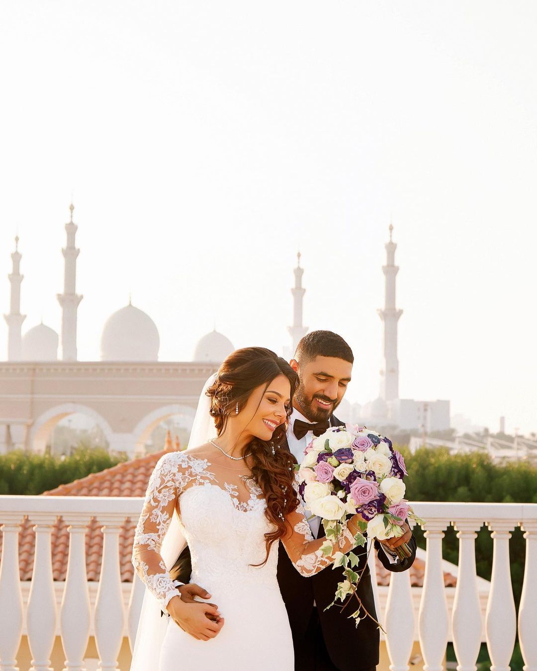 Newlywed couple at the terrace of The Ritz-Carlton Abu Dhabi, Grand Canal.