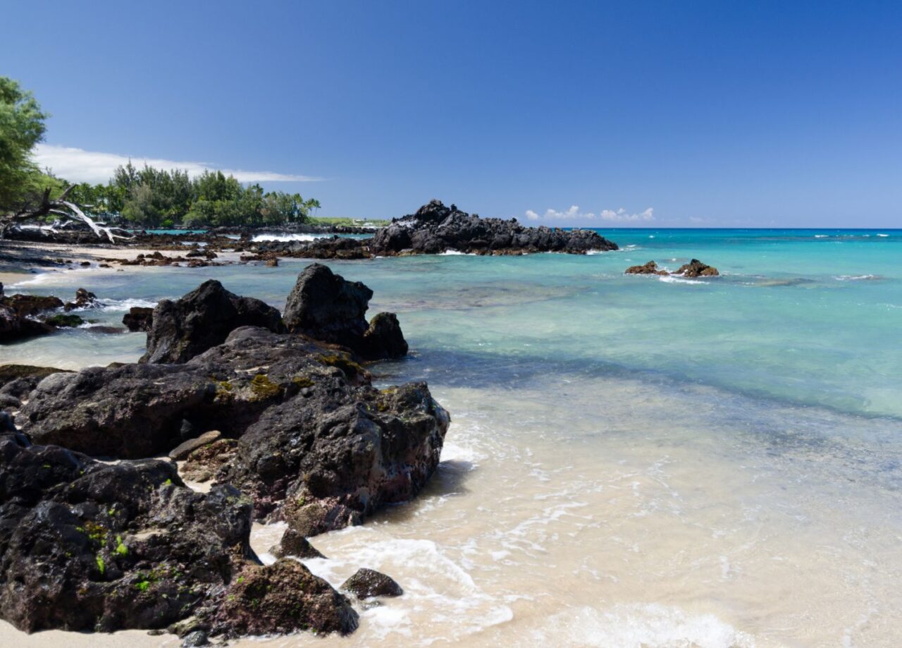 clear blue beach and rocks in hawaii