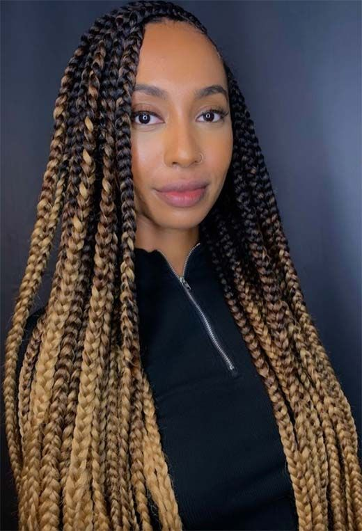 Full picture of lady showing off her ombre braids