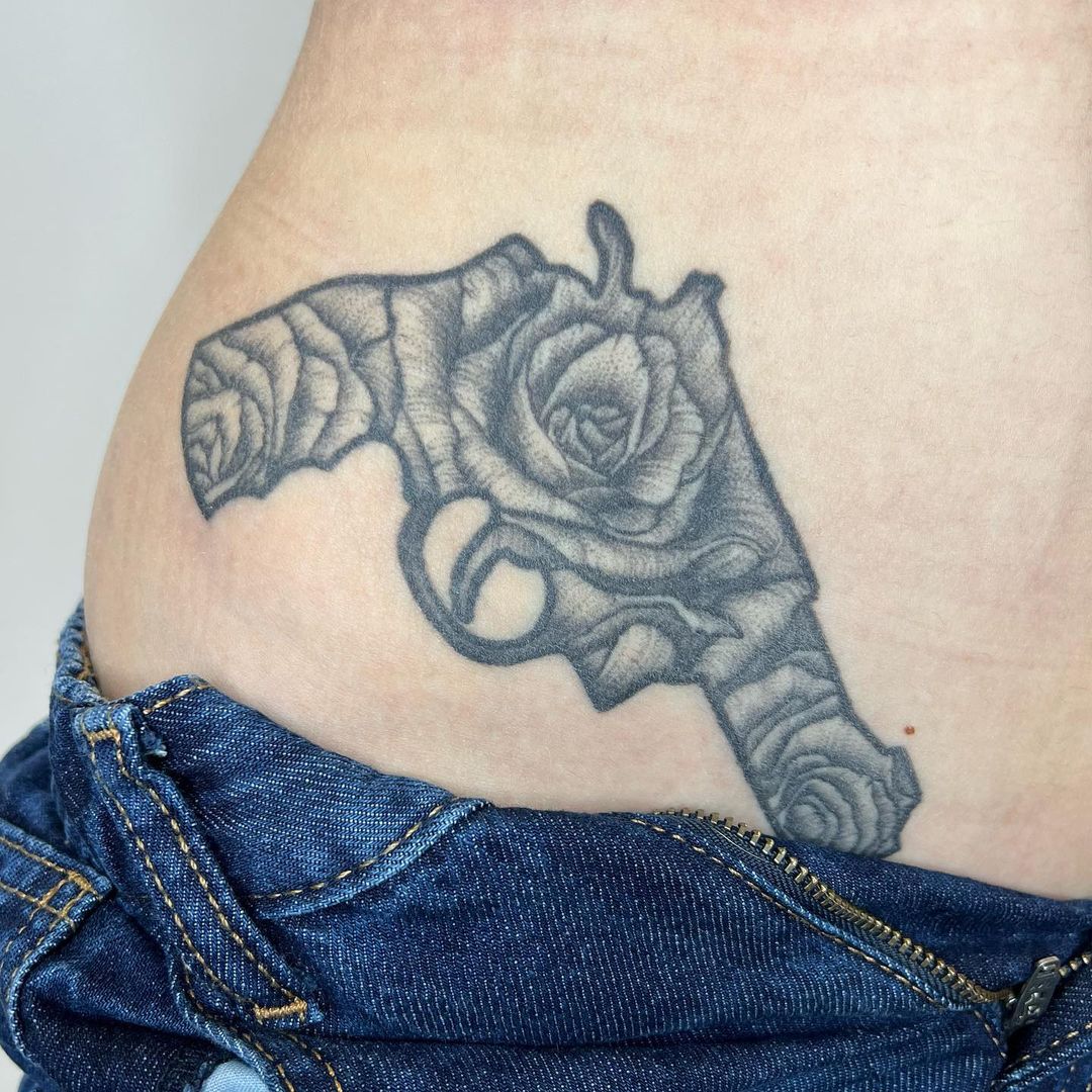 Flower And Gun Tattoo