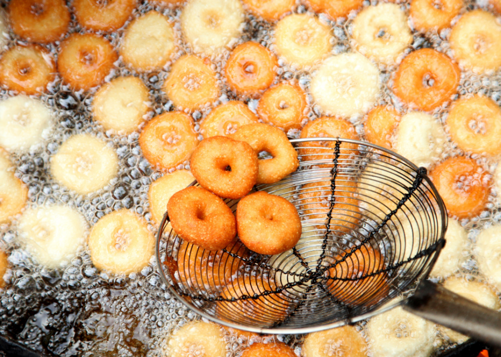 Donuts being deep fried. 