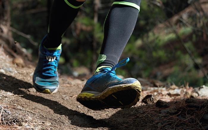 person running in best trail running shoes