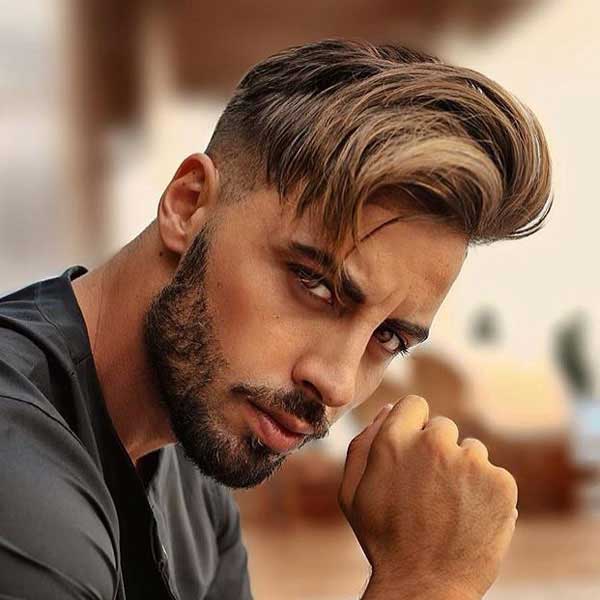 Side Swept Hairstyle with Below Knee Cut and Short Beard