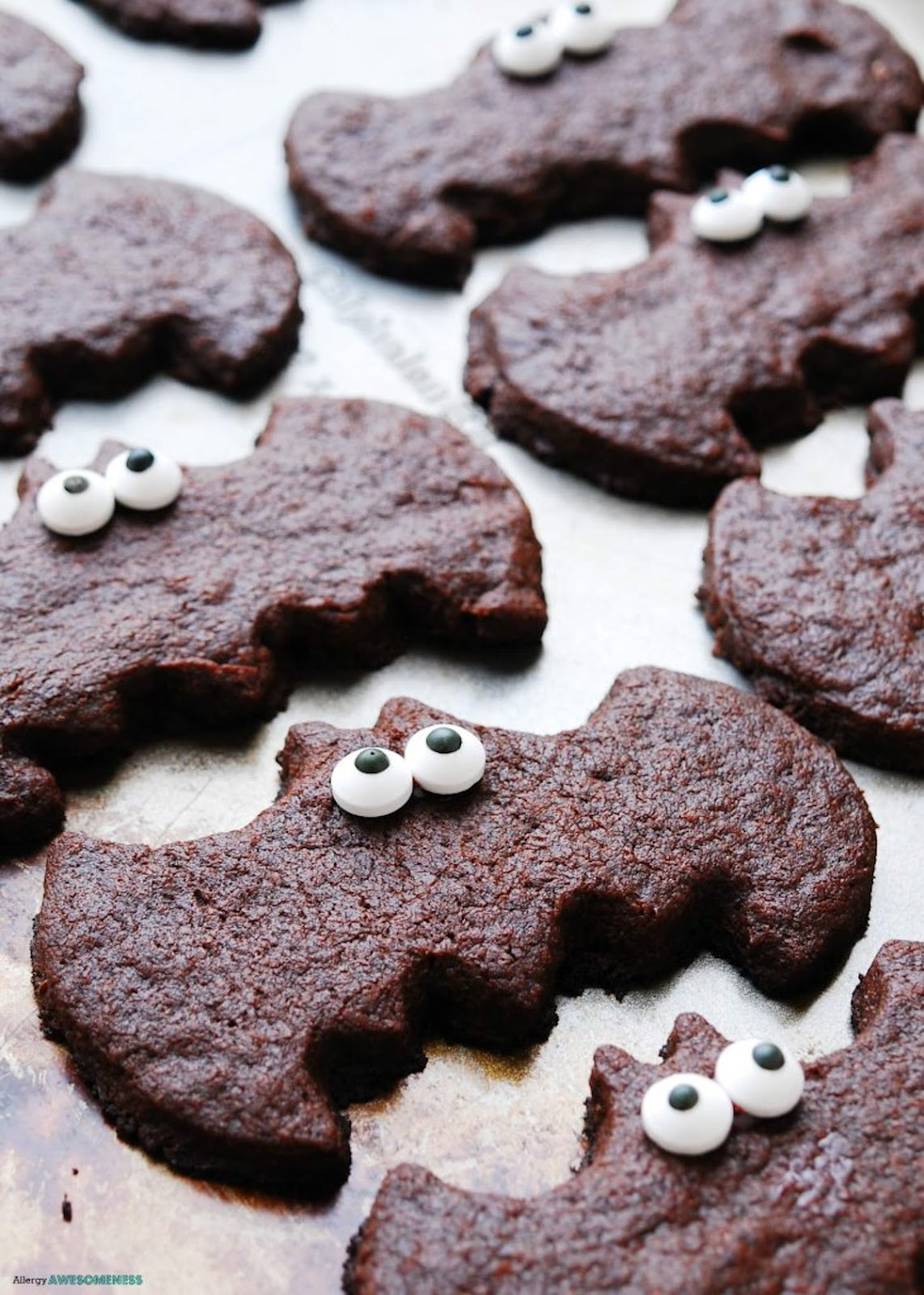 Sugar cookies shaped into bats to serve as healthy Halloween desserts.