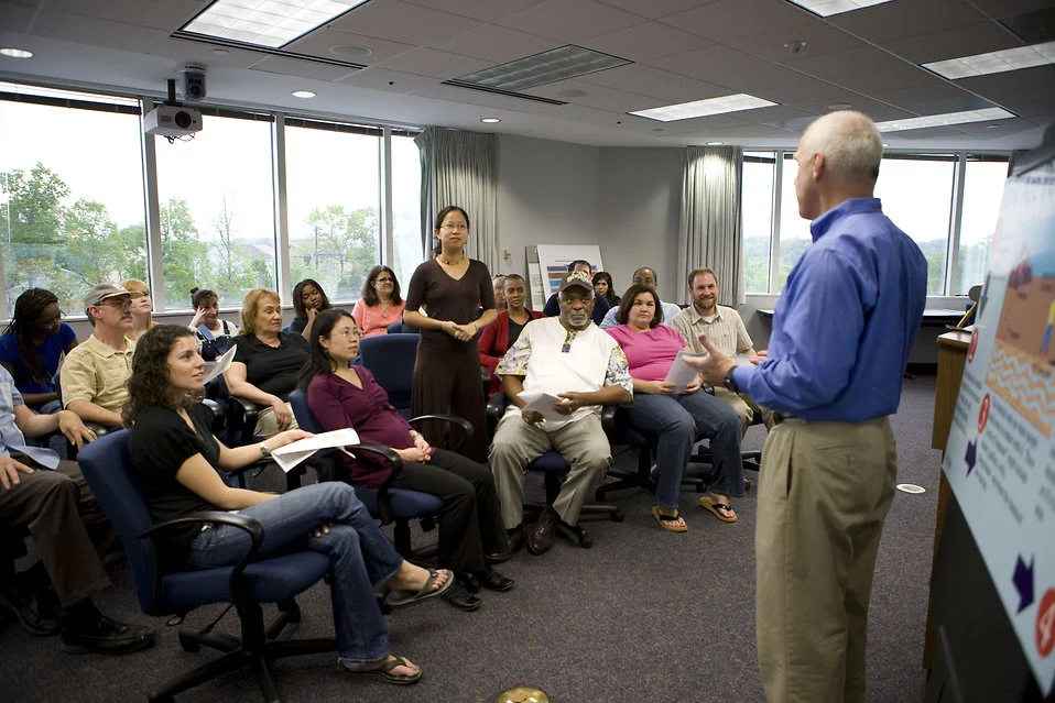 16449-men-and-women-at-a-town-hall-meeting-pv.jpg