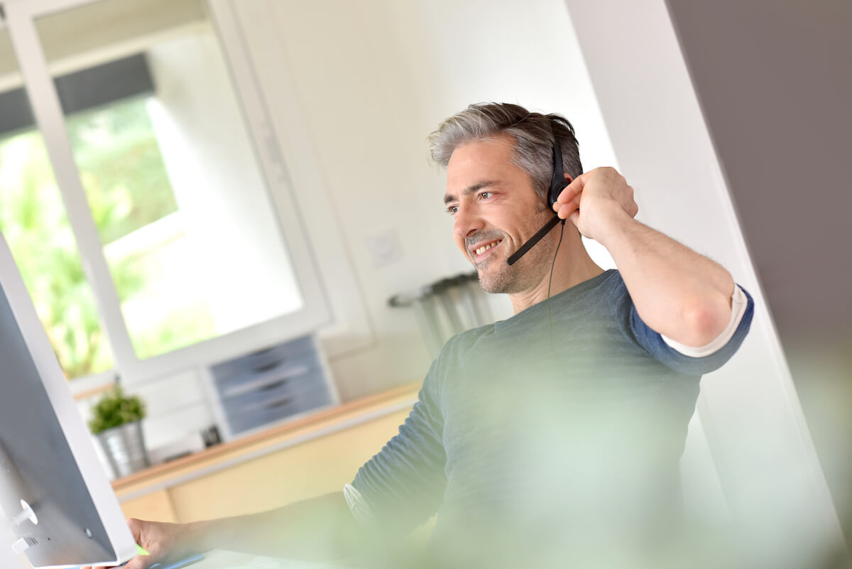 E prescribing software: man using headphones