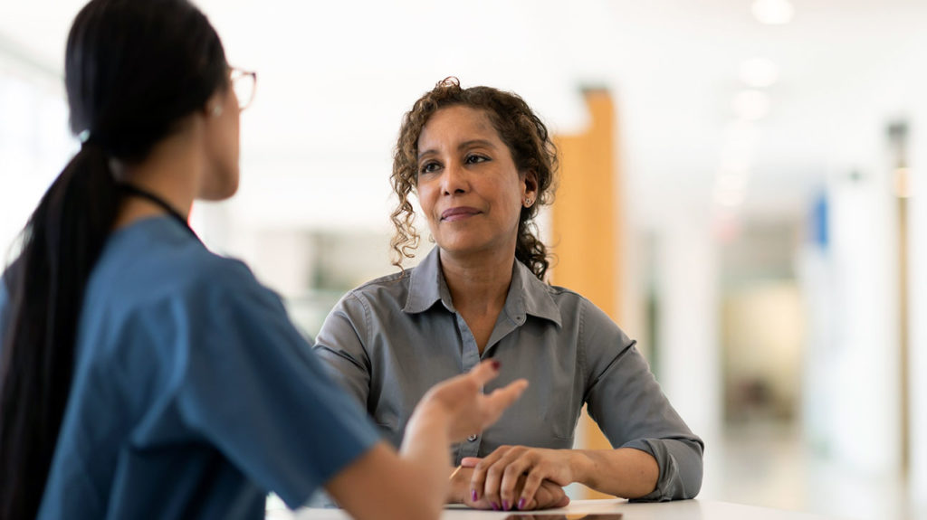 consulting with doctor