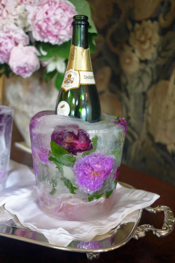 photo of DIY ice buckets with flower petals