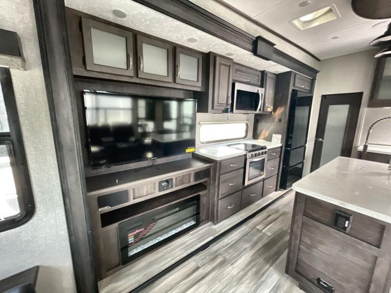 The spacious kitchen and entertainment center make you feel at home wherever you go.