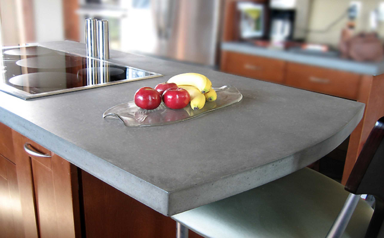 concrete countertop with apples and bananas on top