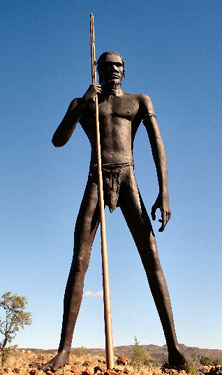 The Big Aboriginal Hunter In Anmatjere - a giant sculpture of an aboriginal australia holding a spear
