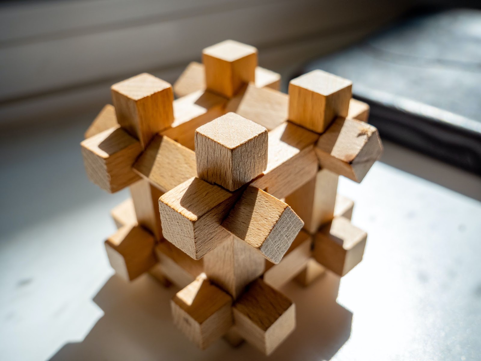 Stacked Puzzle Made Out of Wooden Pieces