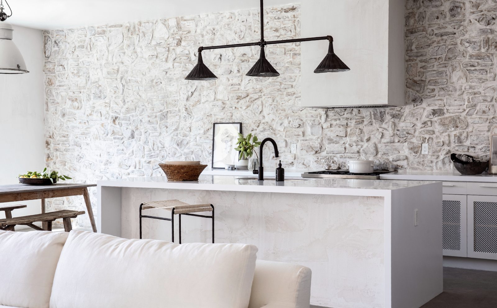 kitchen trend natural stone wall unexpected touch industrial lighting atlanta interiors tara fust