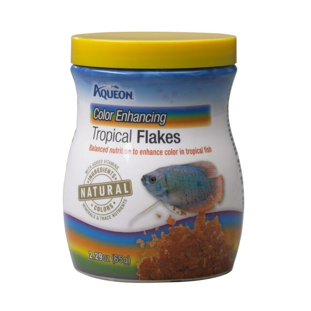 A canister of color-enhancing fish flakes