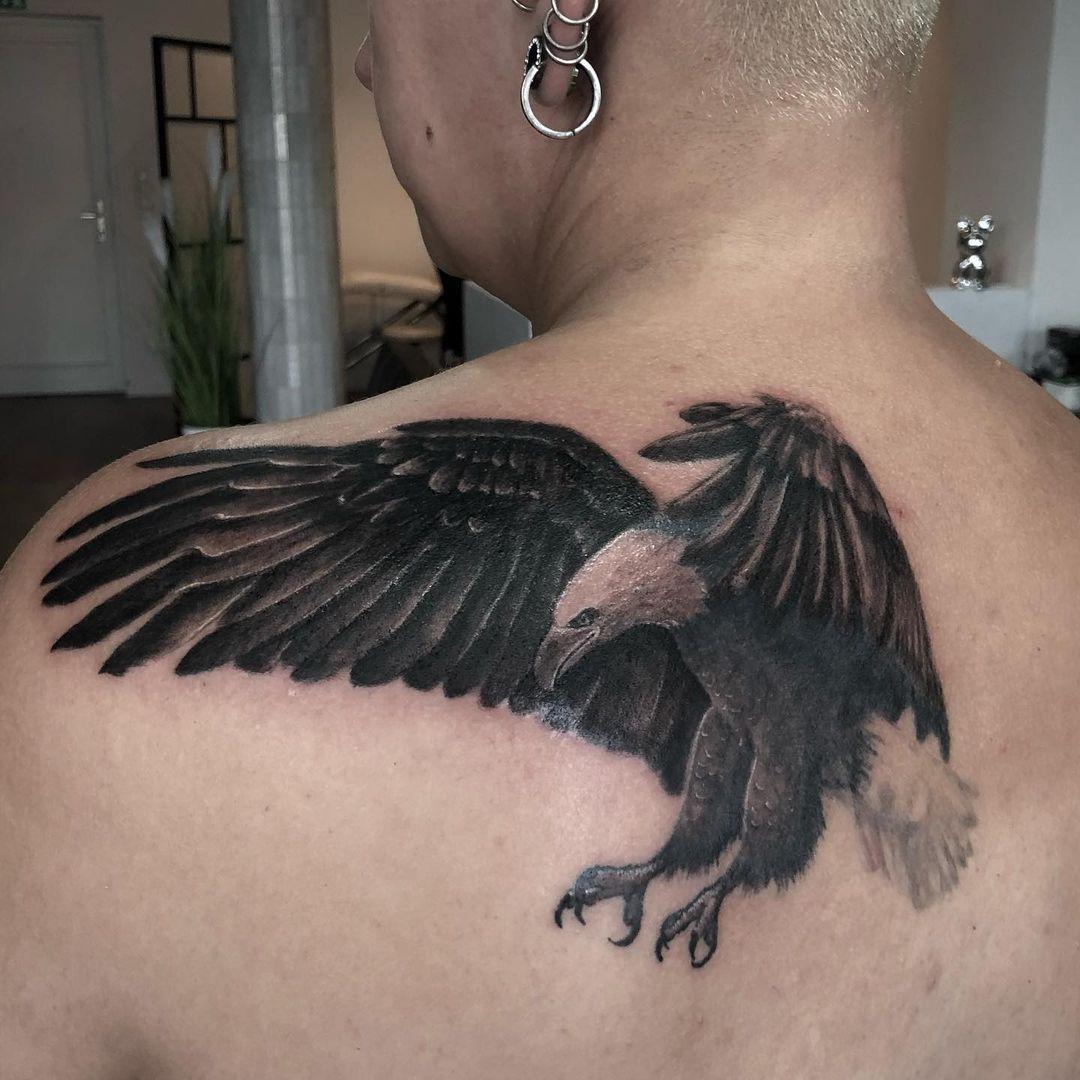 Black Eagle Tattoo On Upper Back