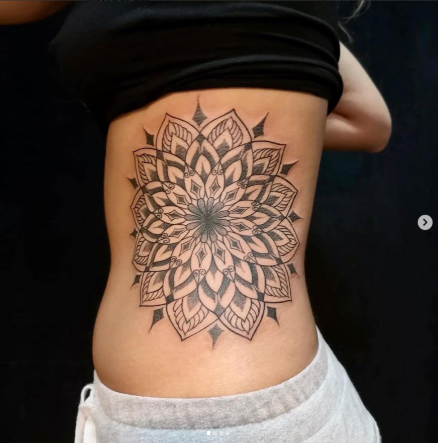 Flower Themed Rib Tattoos 31