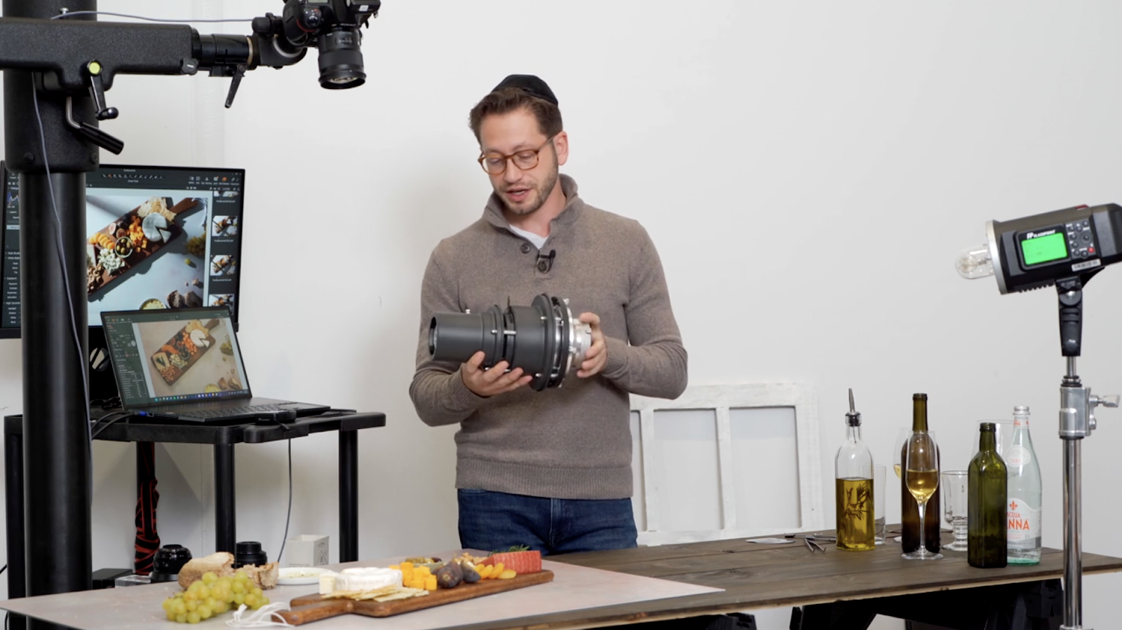 Hudi Greenberger holding an optical snoot.