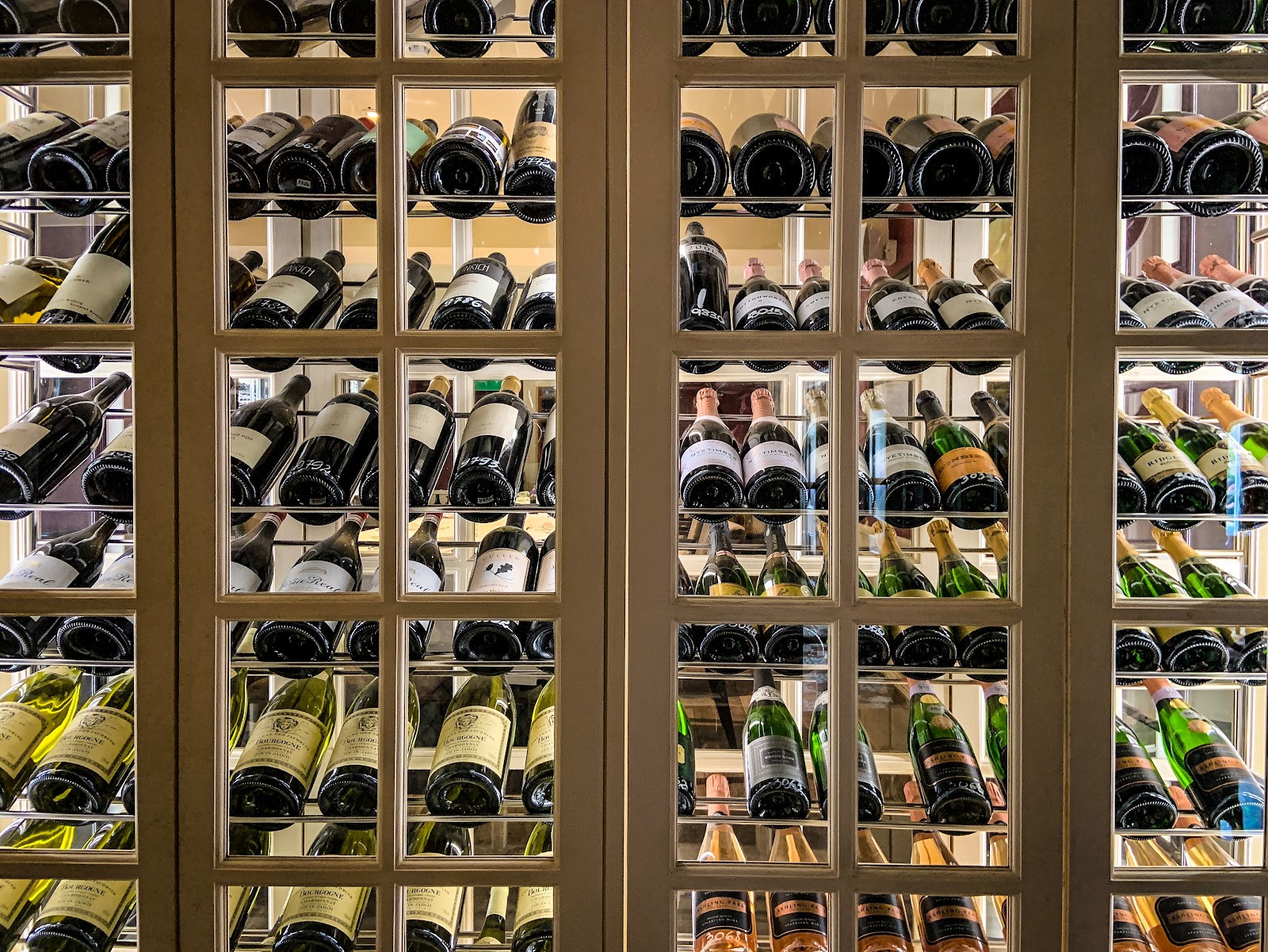wine rack filled with wines