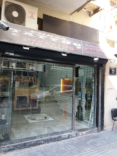Forza Tattoo Piercing