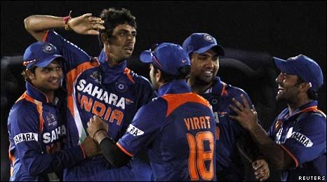 Ashish celebrating with the team after his 4-wicket haul
