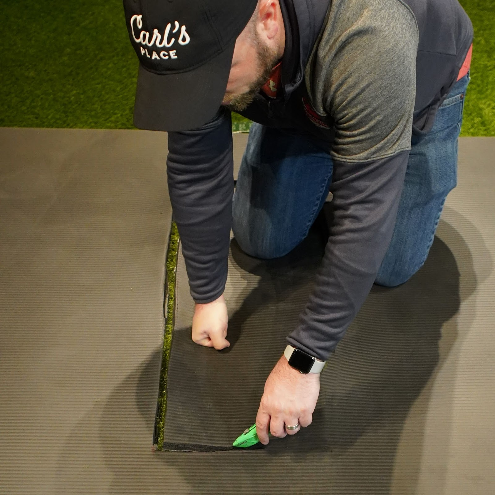 Cutting hole in hitting mat for Carl's Place Divot Hitting Strip