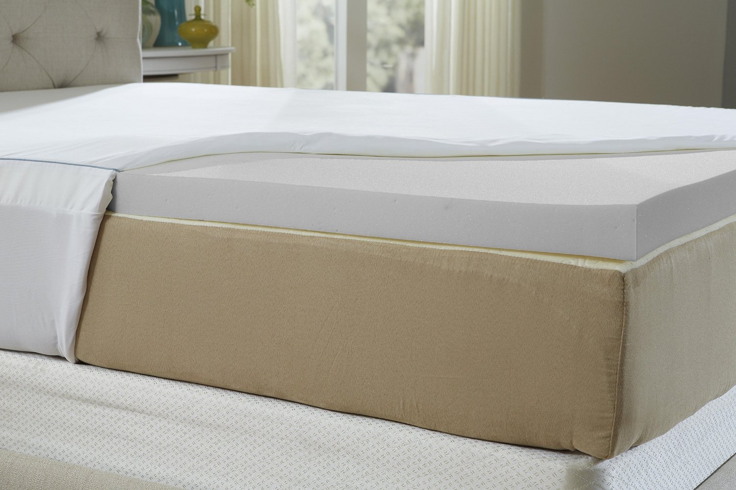Do not stack multiple mattress toppers on top of a memory foam mattress