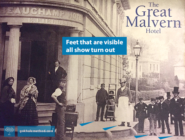 Victorian group outside Beauchamp Hotel, UK, mid-nineteenth century, showing foot turnout 