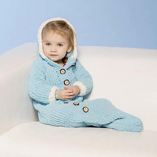 older baby sitting up wearing cozy blue hooded cocoon