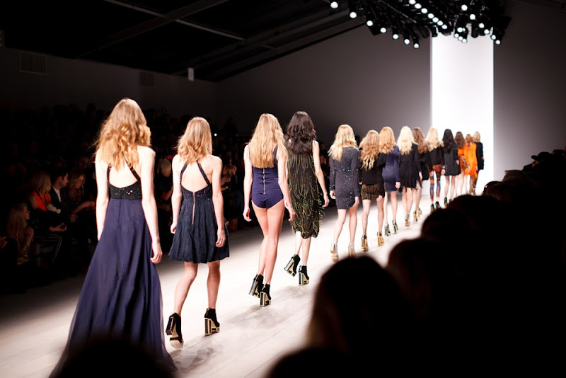 A long line of female models on the catwalk