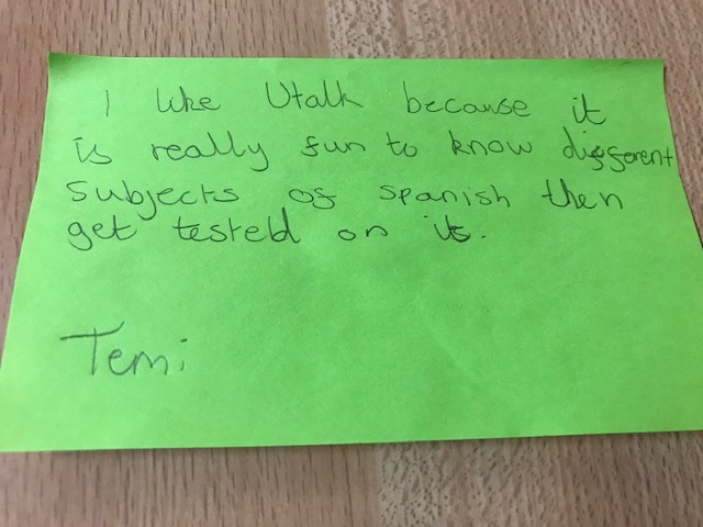 Green post-it note that reads: I like uTalk because it is really fun to know different subjects of Spanish then get tested on it. Temi.