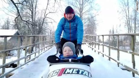 Man turns his yard into bobsled track for his kids - CNN Video