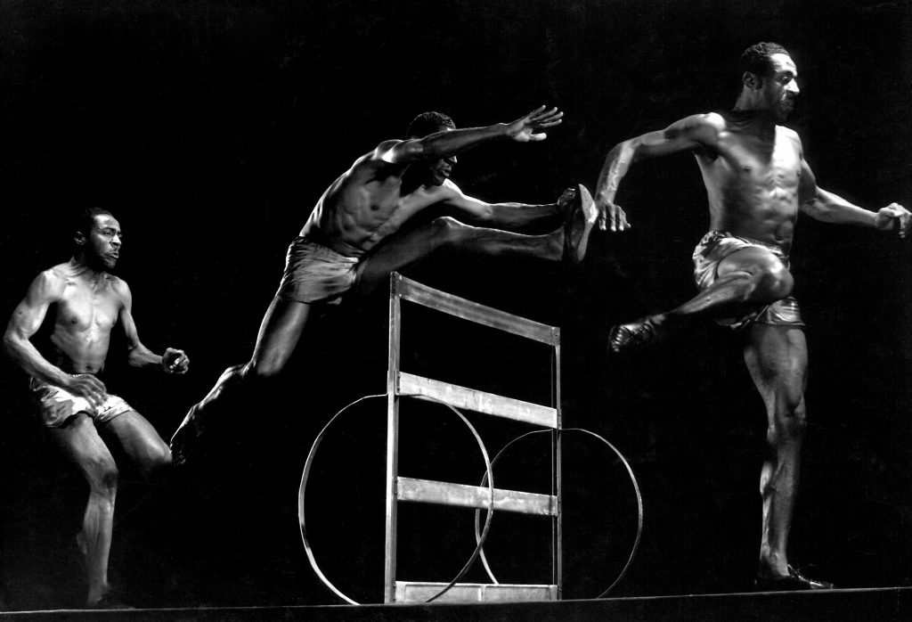 United States pentathlon champion John Borican leaps a hurdle in 1941.