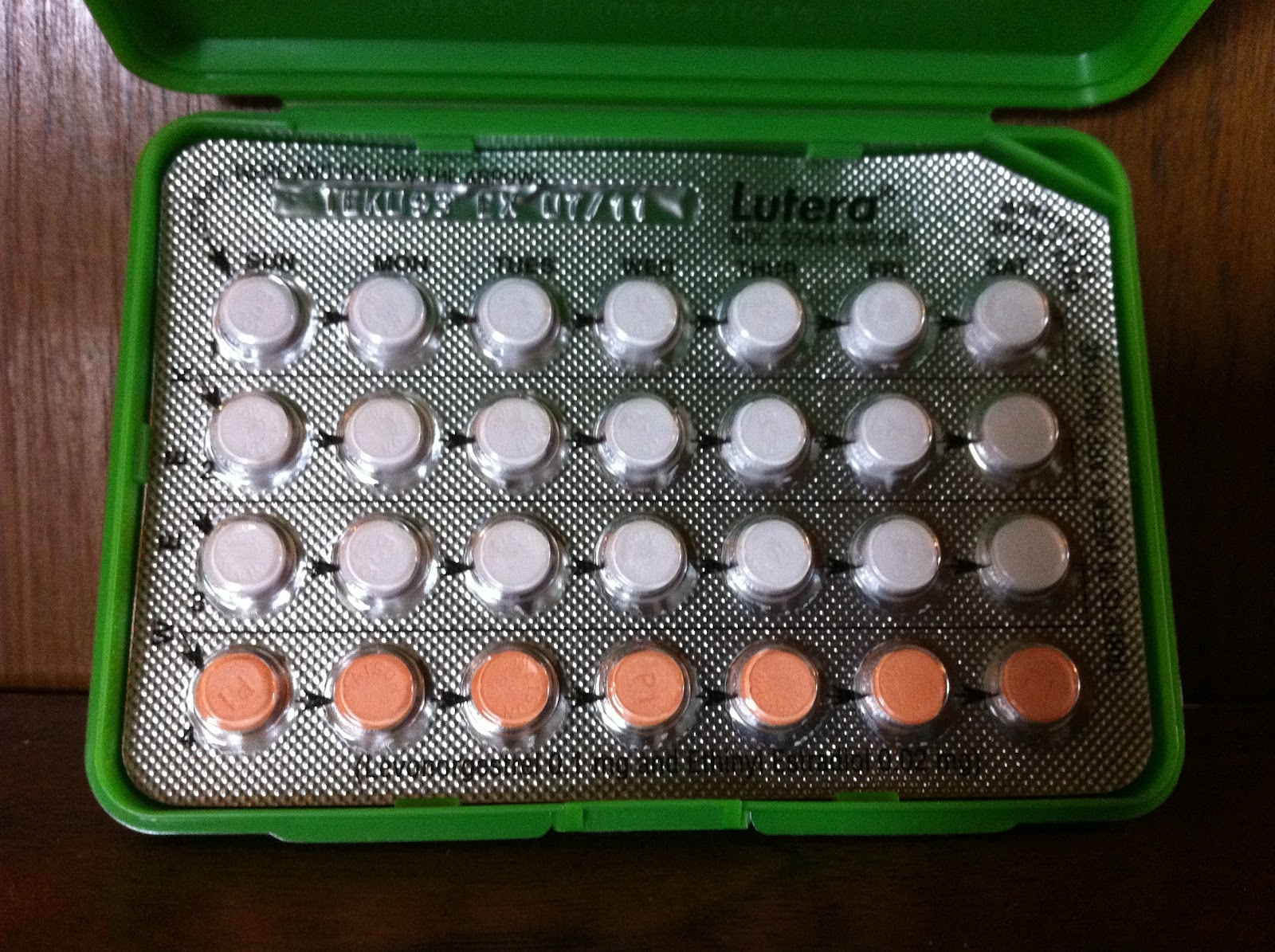 Package of birth control pills in a green container.