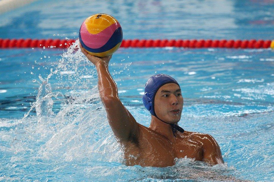 A person playing water polo

Description automatically generated with low confidence
