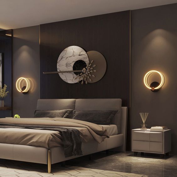 a bedroom with a large bed and a night stand