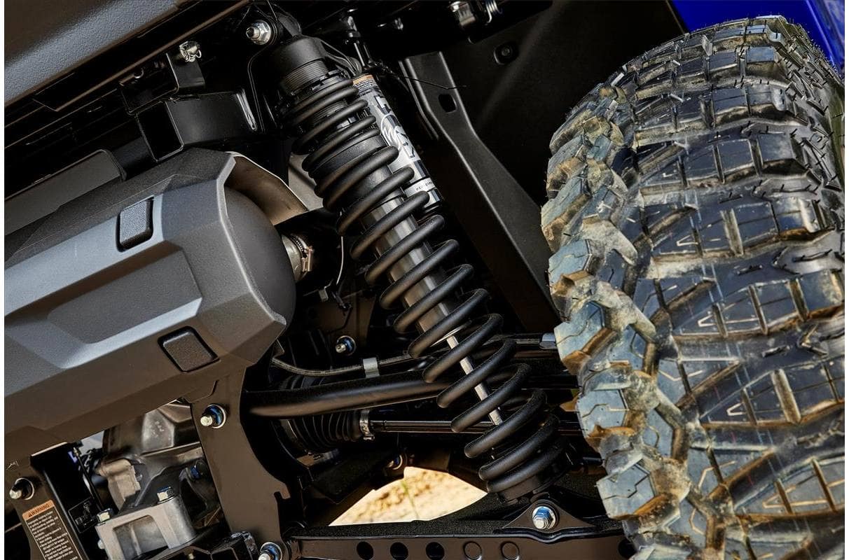 Yamaha Wolverine RMAX2 with advanced suspension and knobby tires for superior off-road performance