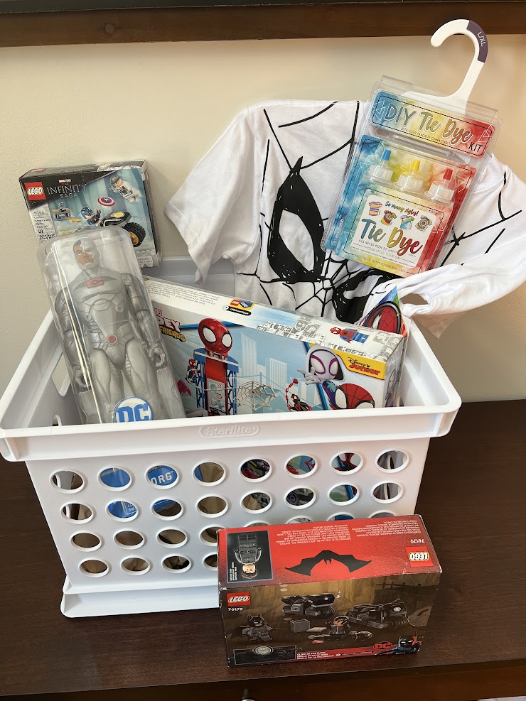 Cyborg Action Figure, Lego Spiderman Web Quarters Hangout Set, Lego Batman and Selina Motorcycle Pursuit Kit, Lego Captain America Face Off and Spiderman Tie Dye Shirt Kit
-Donated by The Dent Family & FAW Friends and Families