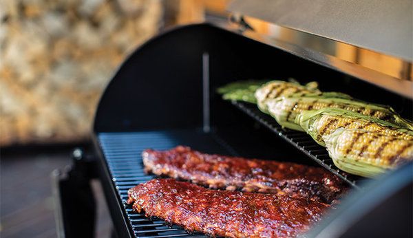 Ribs & corn being cook on a Traeger grill