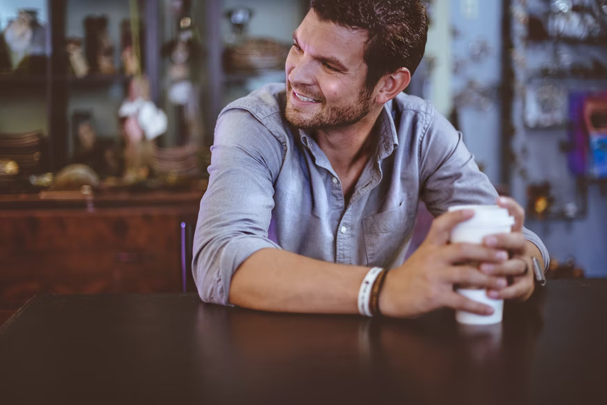 a man having coffee