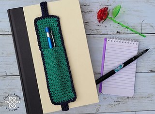 crochet pocket bookmark on top of book